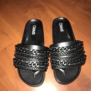 MATTE BLACK CHAIN SLIDES BY CARLOS SANTANA